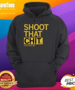 Chazadi Wright wearing the Shoot That Chit hoodie, showcasing stylish streetwear in a vibrant urban setting.