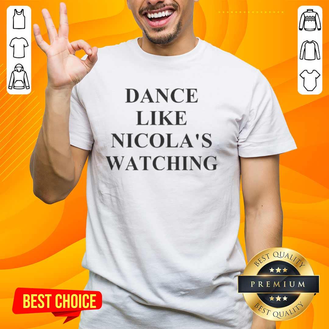 official-dance-like-nicolas-watching-t-shirt-1 Alt Text: Official Dance Like Nicola's Watching T-Shirt featuring a stylish design perfect for dance enthusiasts.