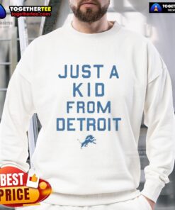 Official Detroit Lions Just A Kid From Detroit sweatshirt in blue, showcasing team pride and stylish comfort.