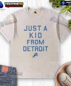 Official Detroit Lions 'Just A Kid From Detroit' washed t-shirt featuring team logo and casual style for fans.