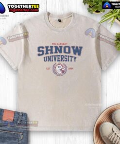 Official Dion Dawkins You Already Shnow University Buffalo Bills football t-shirt, established 1994, in a washed style.