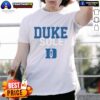 Alt Text: Official Duke Blue Devils Sole T-Shirt featuring bold team logo and vibrant blue color for fans and supporters.