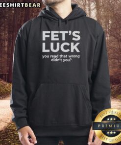 Official Fets Luck You Read That Wrong Hoodie in black with bold white text, perfect for casual wear and unique style.