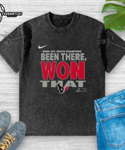 Official Houston Texans 2025 AFC South Champions washed t-shirt featuring team logo and championship design.