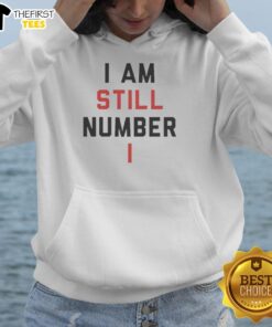 Official I Am Still Number One Hoodie featuring bold text design on a stylish black background.