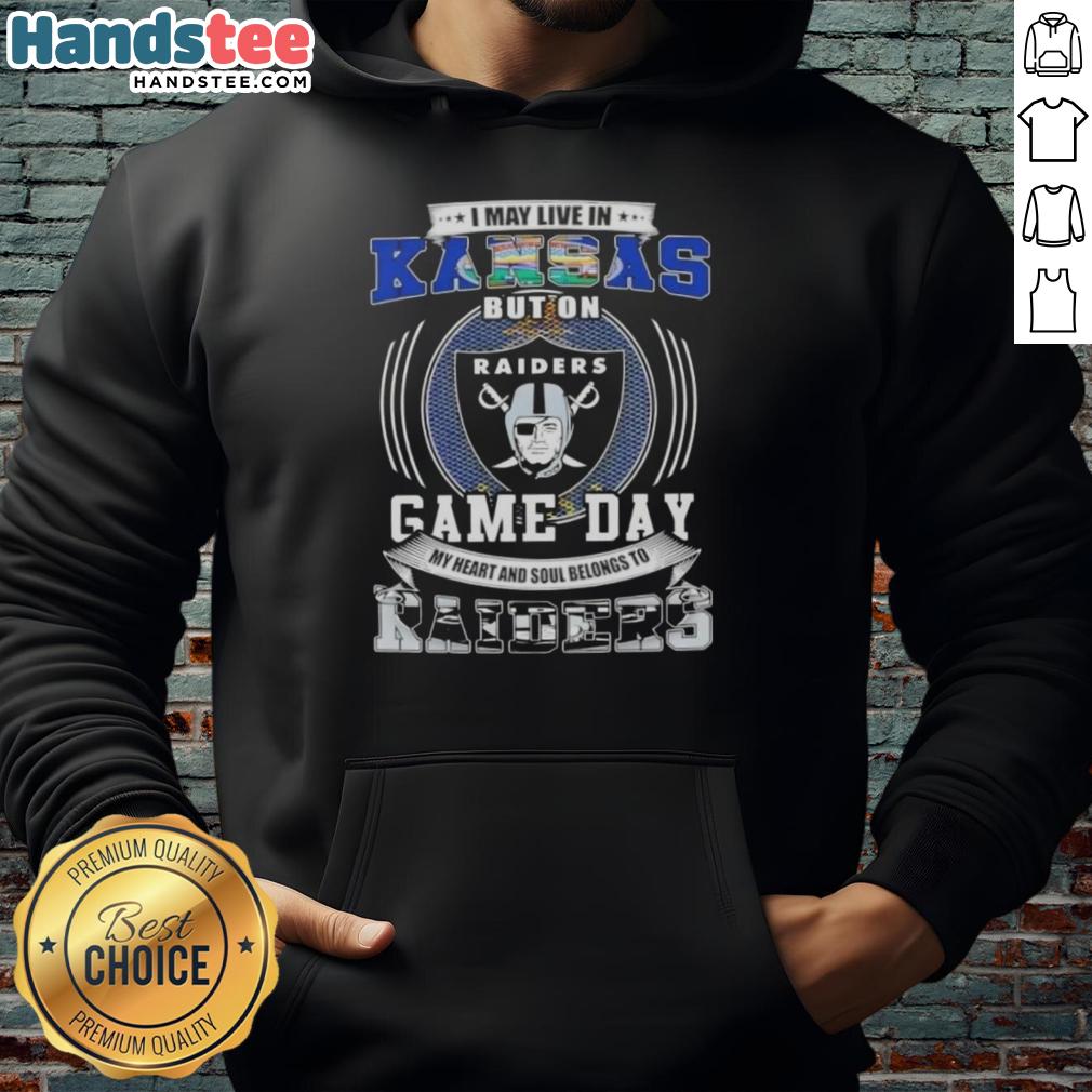 official-i-may-live-in-kansas-but-on-game-day-my-heart-and-soul-belongs-to-las-vegas-raiders-football-hoodie Person wearing a 'I May Live In Kansas But On Game Day My Heart And Soul Belongs To Las Vegas Raiders' hoodie.
