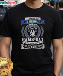 Alt Text: Kansas fan wearing 'I May Live In Kansas But On Game Day My Heart Belongs To Las Vegas Raiders' T-Shirt