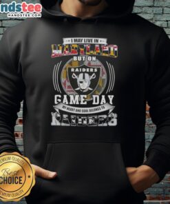 Person wearing a Las Vegas Raiders football hoodie, showcasing team spirit while living in Maryland on game day.