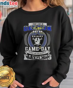 Alt Text: Cozy sweatshirt featuring I May Live In Oregon But On Game Day My Heart Belongs To Las Vegas Raiders Football.