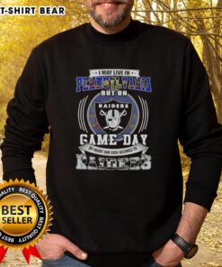 Cozy sweatshirt with 'I May Live In Pennsylvania But On Game Day My Heart Belongs To Las Vegas Raiders' slogan.
