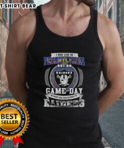 Alt Text: Woman wearing a tank top with 'I May Live In Pennsylvania But My Heart Belongs To Las Vegas Raiders' design.