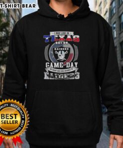Texas fan in Las Vegas Raiders hoodie, showcasing team pride on game day with bold graphics and vibrant colors.
