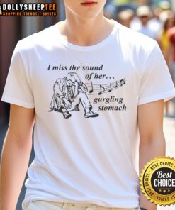 Official I Miss The Sound Of Her Gurgling Stomach T-Shirt design featuring playful text and vibrant colors.