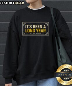 Alt Text: Cozy 'It's Been A Long Year, It's Still January' sweatshirt, perfect for winter lounging and expressing your 2023 vibes.