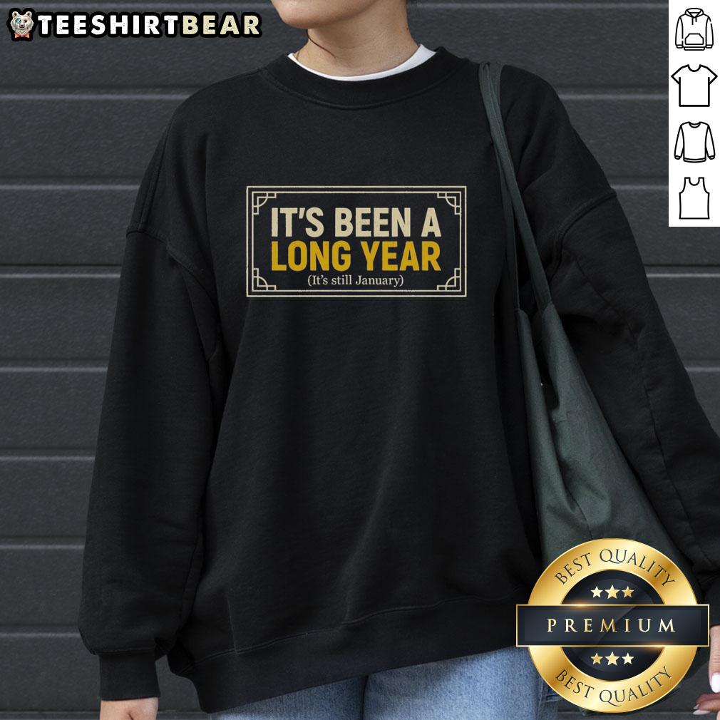official-its-been-a-long-year-its-still-january-sweatshirt Alt Text: Cozy 'It's Been A Long Year, It's Still January' sweatshirt, perfect for winter lounging and expressing your 2023 vibes.