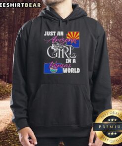 Cozy 'Just An Arizona Girl In A Kansas World' hoodie displayed on a rustic wooden background, perfect for casual style.
