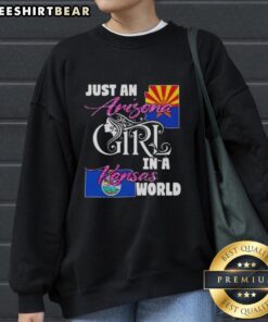 Official Just An Arizona Girl In A Kansas World Sweatshirt in a cozy setting, showcasing its stylish design and vibrant colors.