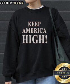 Alt Text: Official Keep America High 2026 patriotic sweatshirt featuring bold graphics and vibrant colors for a stylish look.