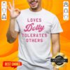 Official Loves Dolly Tolerates Others T-Shirt featuring a vibrant design celebrating Dolly Partons iconic style.