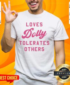 Official Loves Dolly Tolerates Others T-Shirt featuring a vibrant design celebrating Dolly Partons iconic style.