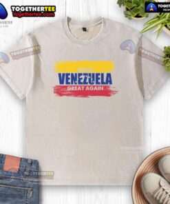 Alt Text: Official Make Venezuela Great Again flag design on a washed T-shirt for patriotic supporters.