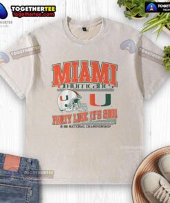Alt Text: Official Miami Football CFP Party Like It's 2001 washed t-shirt featuring vintage design and team colors.