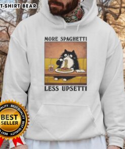 Black cat enjoying Italian food while wearing an Official More Spaghetti Less Upsetti hoodie, perfect for cat lovers.