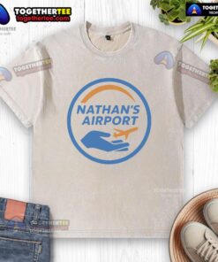 Alt Text: Official Nathan's Airport logo on a washed t-shirt, showcasing a stylish and comfortable design for aviation enthusiasts.