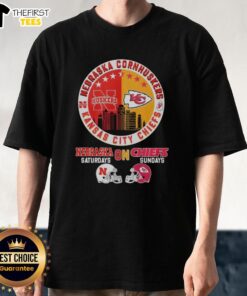 Official Nebraska Cornhuskers and Kansas City Chiefs helmet logo mashup t-shirt design for fans on game days.