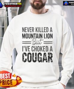 Cozy Official Never Killed A Mountain But Lion Sweatshirt featuring a playful cougar graphic, perfect for casual wear.