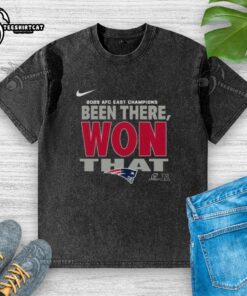 Official New England Patriots 2025 AFC East Champions washed t-shirt featuring team logo and championship design.