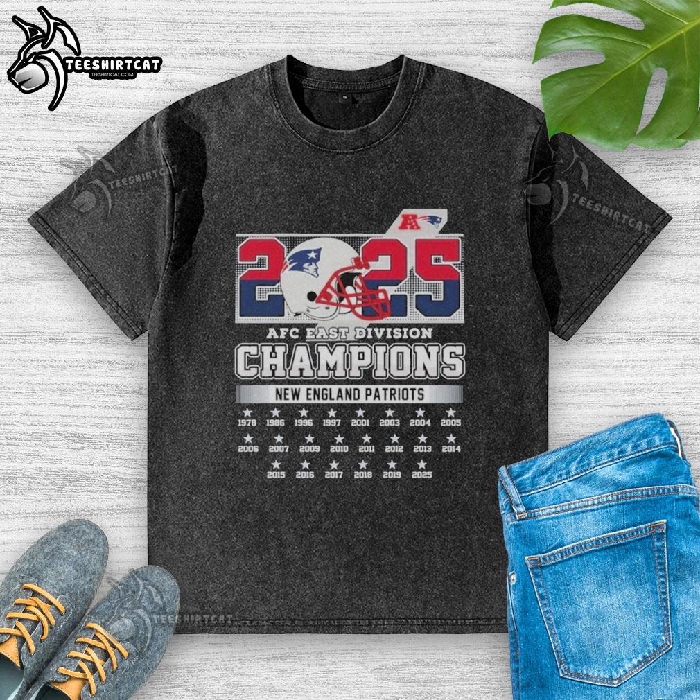official-new-england-patriots-2025-afc-east-divison-champions-helmet-washed-t-shirt Alt Text: Official New England Patriots 2025 AFC East Division Champions helmet graphic on a washed t-shirt, showcasing team pride.