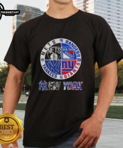 Alt Text: Official New York City sports t-shirt featuring Nets, Rangers, Giants, and Yankees logos in a stylish design.