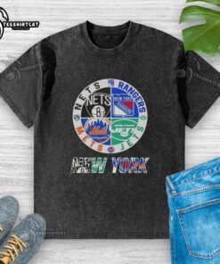Alt Text: Official New York City Sports Nets Rangers Jets Mets logos on a combined washed t-shirt design.