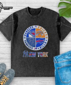 Official New York City Sports Rangers, Knicks, Bills, Yankees logos on a stylish washed t-shirt design.