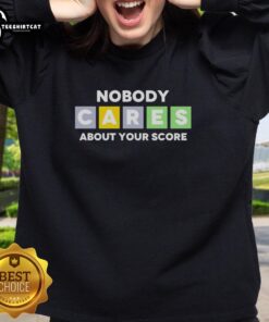 Official Nobody Cares About Your Score Sweatshirt in black, featuring a bold graphic design, perfect for casual wear.