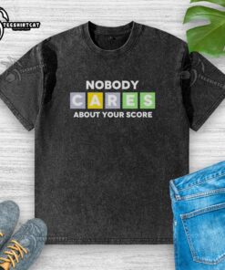Official Nobody Cares About Your Score Washed T-Shirt in soft fabric, featuring a casual design perfect for everyday wear.