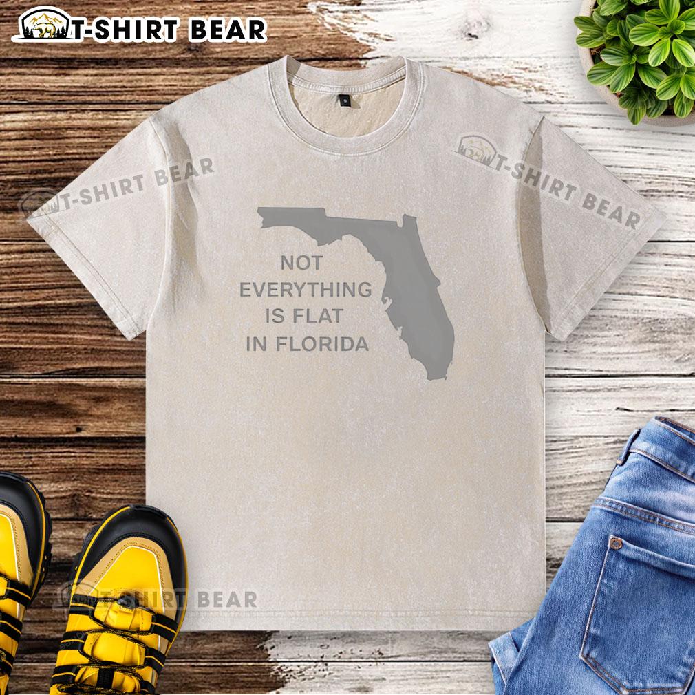Official Not Everything Is Flat In Florida State Washed T Shirt Official Florida State 'Not Everything Is Flat' washed t-shirt showcasing vibrant colors and unique design for fans.