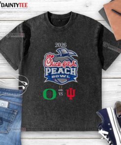 Alt Text: Official Oregon Ducks vs Indiana Hoosiers 2026 Chick-fil-A Peach Bowl washed t-shirt featuring team logos and colors.