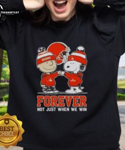 Official Peanut Snoopy and Charlie Brown Cleveland Browns sweatshirt, celebrating fandom with 'Forever Not Just When We Win' slogan.