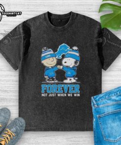Official Peanut Snoopy and Charlie Brown Detroit Lions Forever t-shirt design featuring a playful football theme.