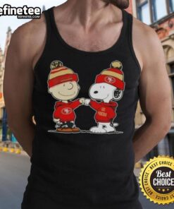 Charlie Brown and Snoopy fist bump on a San Francisco 49ers football tank top, celebrating team spirit.