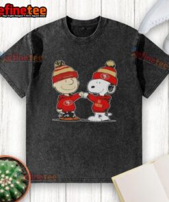 Alt Text: Charlie Brown and Snoopy fist bump on a San Francisco 49ers washed football t-shirt, celebrating team spirit.