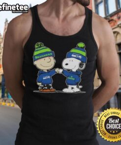 Alt Text: Official Peanuts Charlie Brown fist bump with Snoopy on Seattle Seahawks football tank top design.
