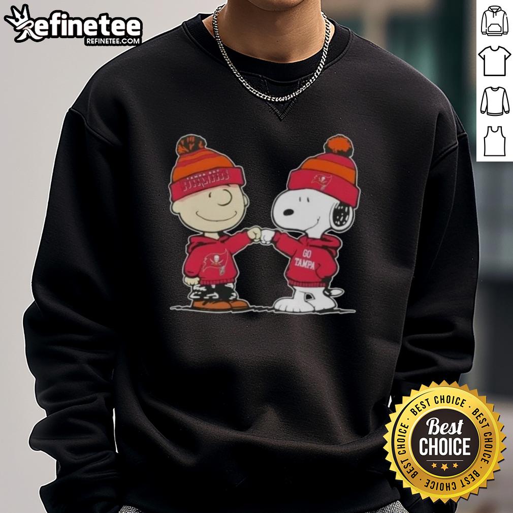 official-peanuts-charlie-brown-fist-bump-snoopy-x-tampa-bay-buccaneers-football-sweatshirt Alt Text: Official Peanuts Charlie Brown fist bump with Snoopy on Tampa Bay Buccaneers football sweatshirt design.