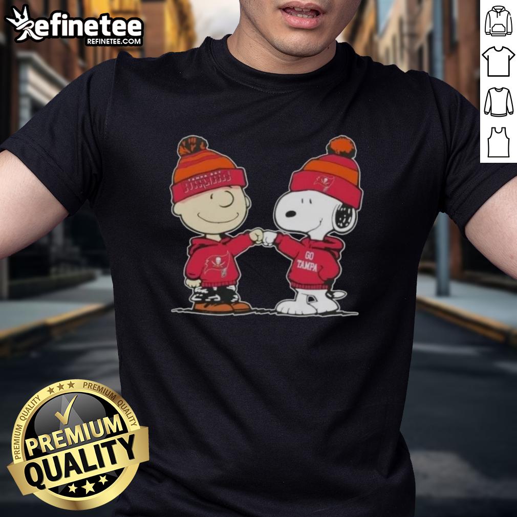 official-peanuts-charlie-brown-fist-bump-snoopy-x-tampa-bay-buccaneers-football-t-shirt Official Peanuts Charlie Brown fist bump with Snoopy on Tampa Bay Buccaneers football T-shirt design.