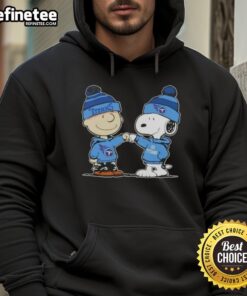 Alt Text: Charlie Brown and Snoopy fist bump in Tennessee Titans football hoodie, celebrating Peanuts fandom and team spirit.