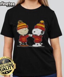 Official Peanuts Charlie Brown and Snoopy fist bump in Washington Commanders Ladies Tee design, perfect for football fans.