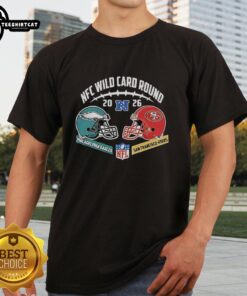 Official Philadelphia Eagles vs San Francisco 49ers 2026 NFC Wild Card Round T-Shirt featuring team logos and game details.
