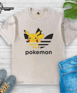 Official Pokemon Anniversary Pikachu Trefoil Parody Logo on a washed t-shirt, showcasing a unique playful design.